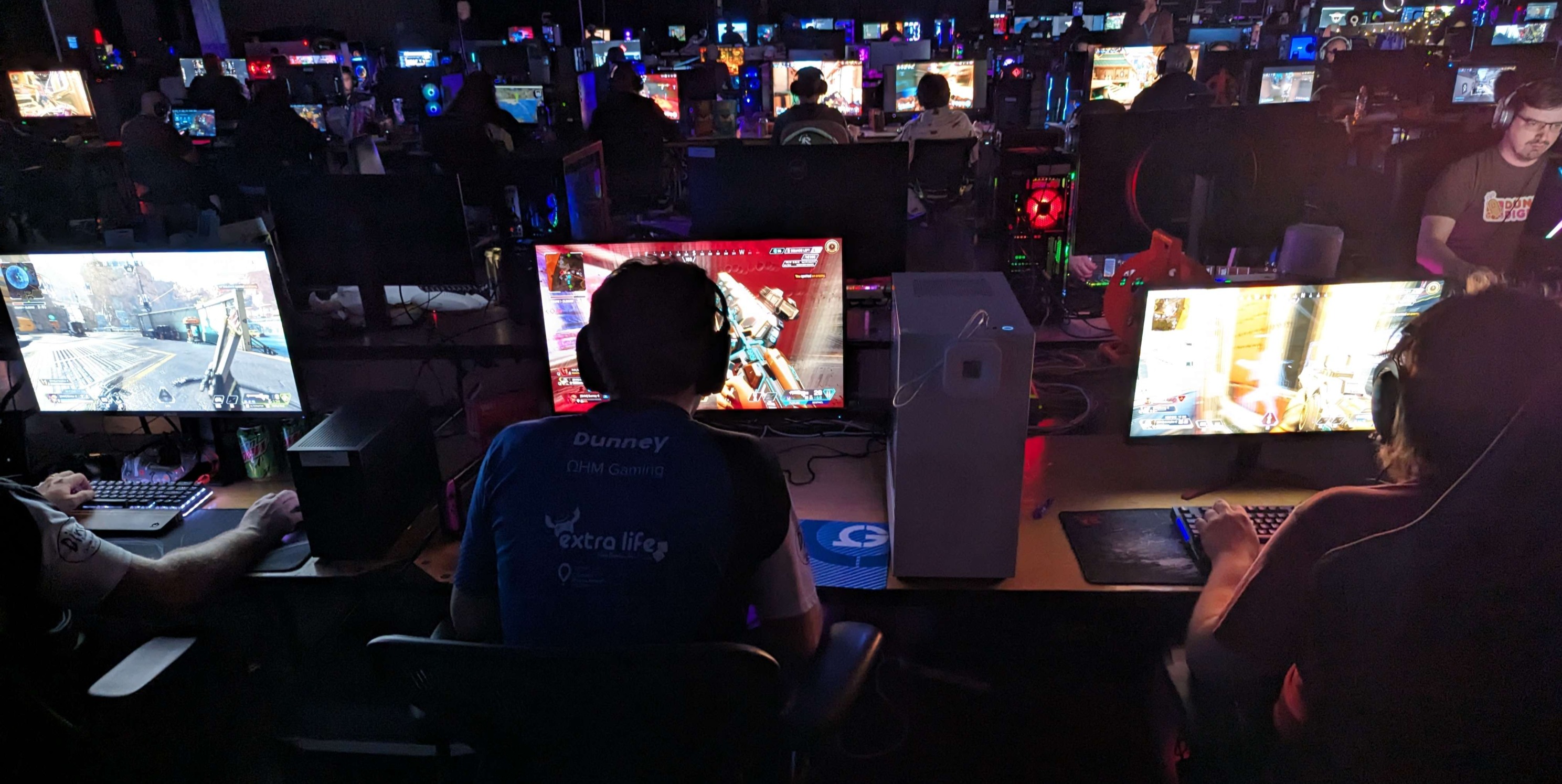 Gamers gathered at LANFest Colorado with rows of gaming PCs
